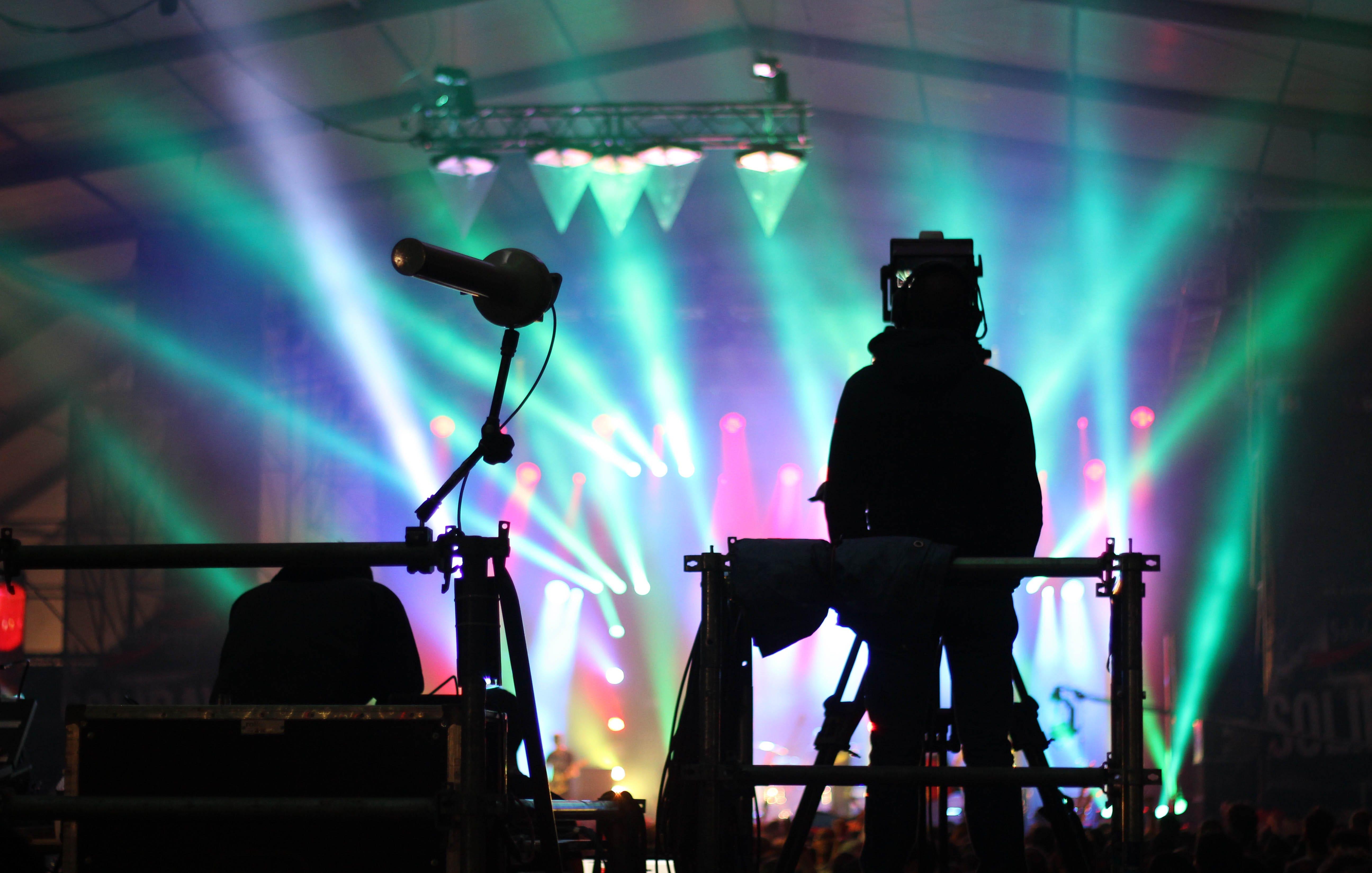 Full-service live event production with stage lighting, sound support, and a concert-ready setup.